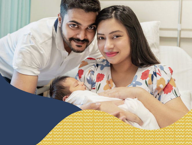Happy family with the newborn_Help kids hear_IN.jpg