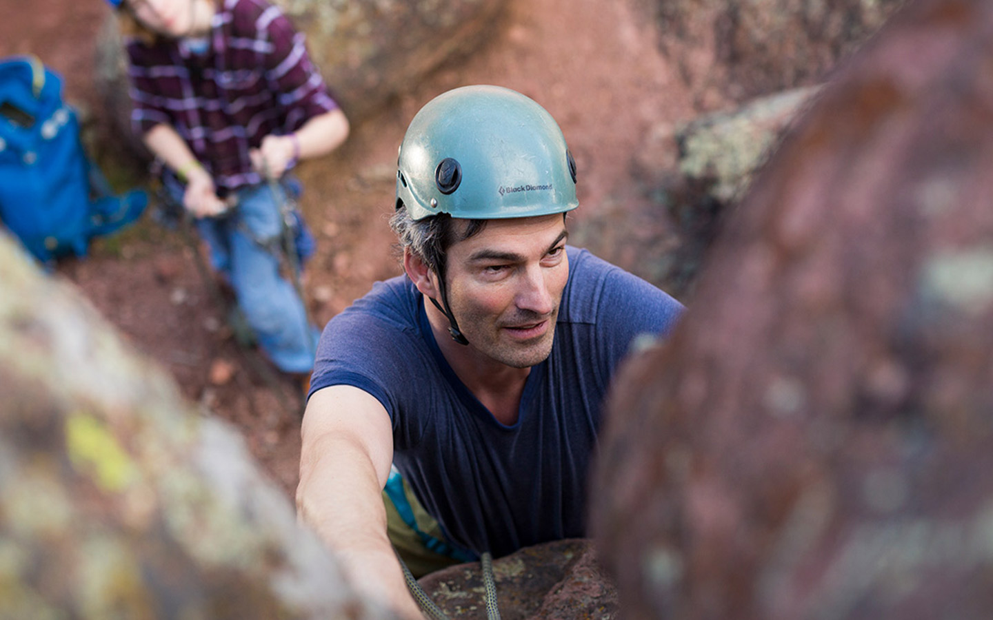 Cochlear recipient Mattias rock climbing with his family