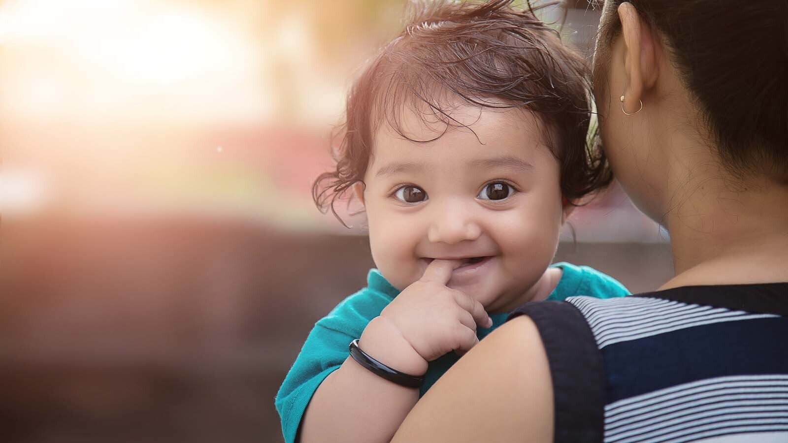 IN_Helphidshear_Smiling baby and Mum.jpg