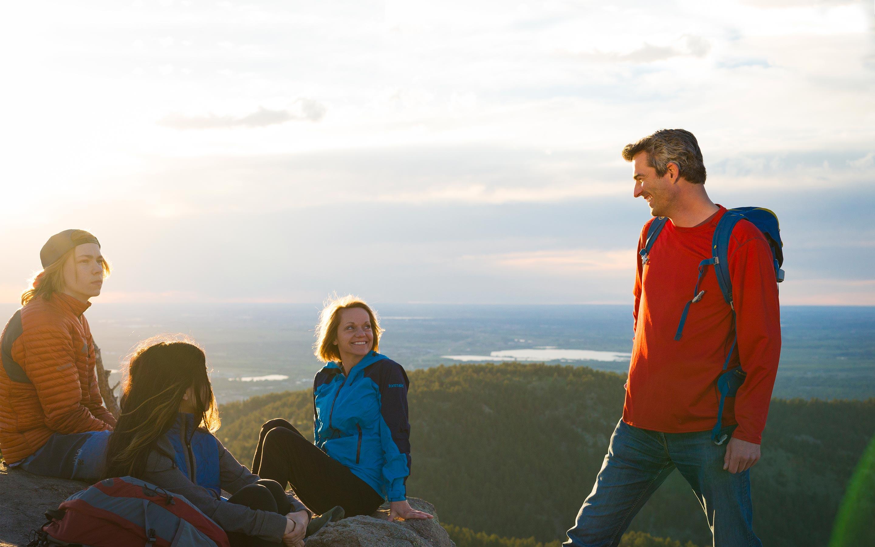 Cochlear implant recipient Mathias hikes with his family