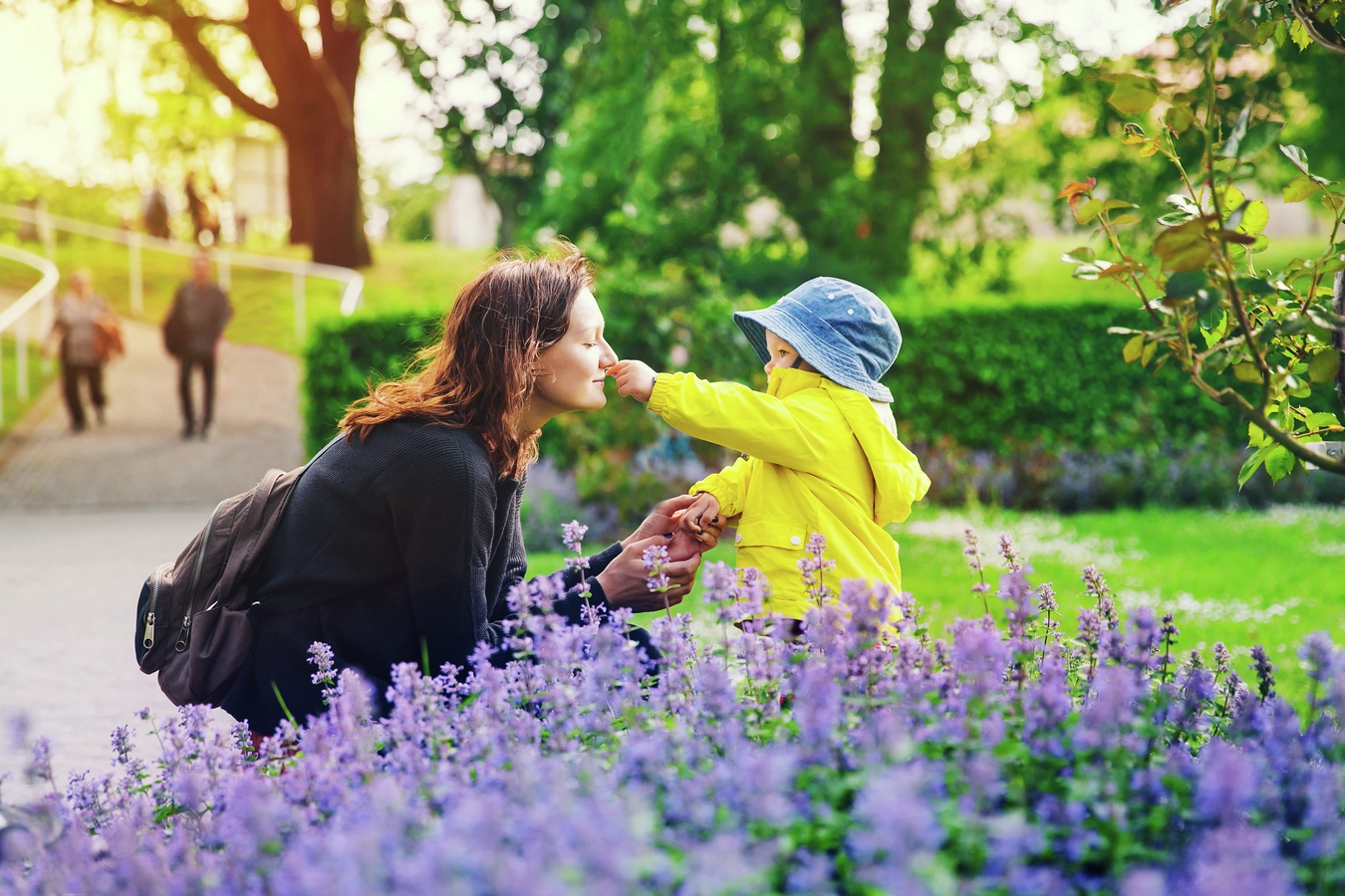 Woman with toddler in a park