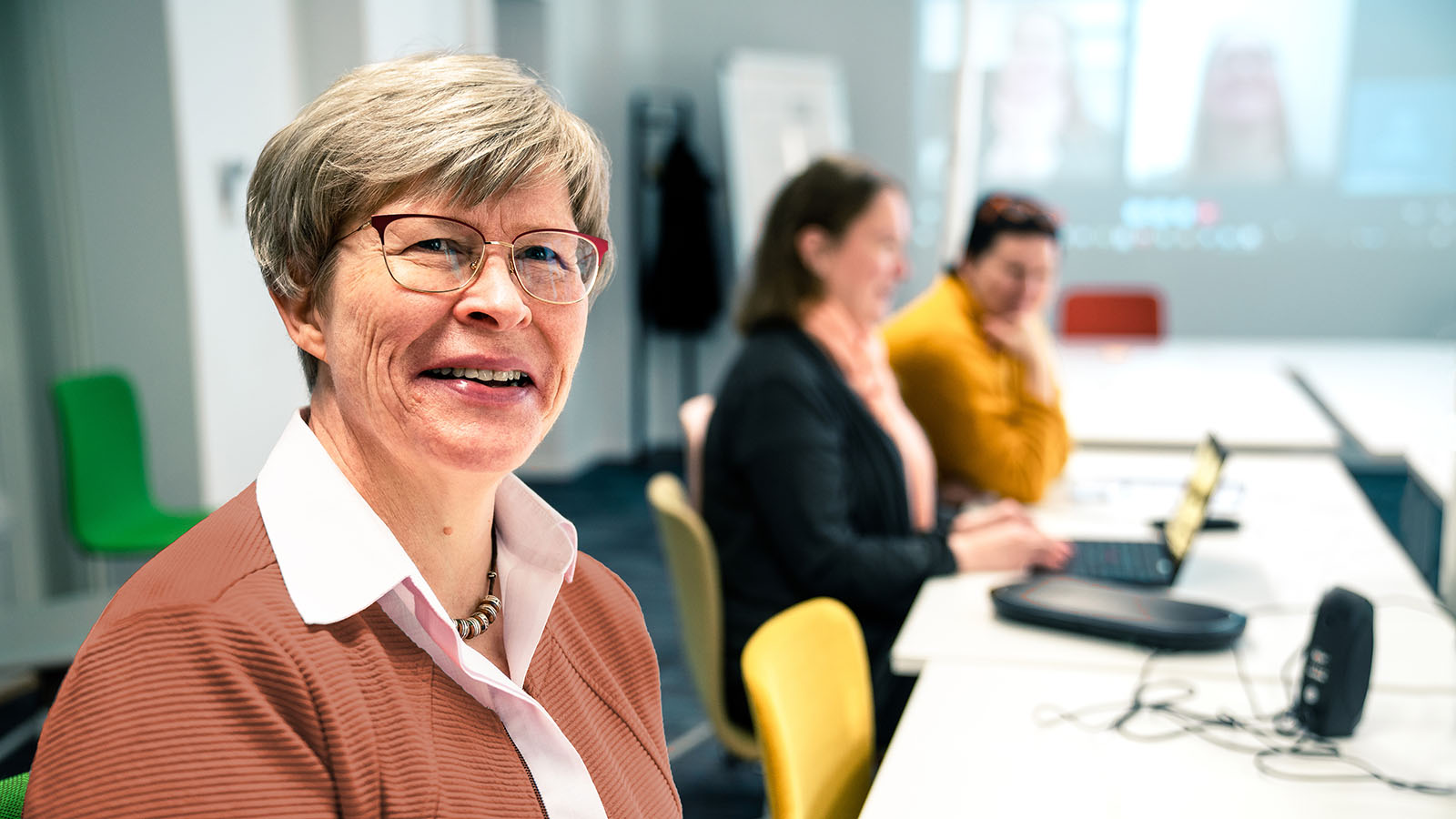 Helinä in an office setting