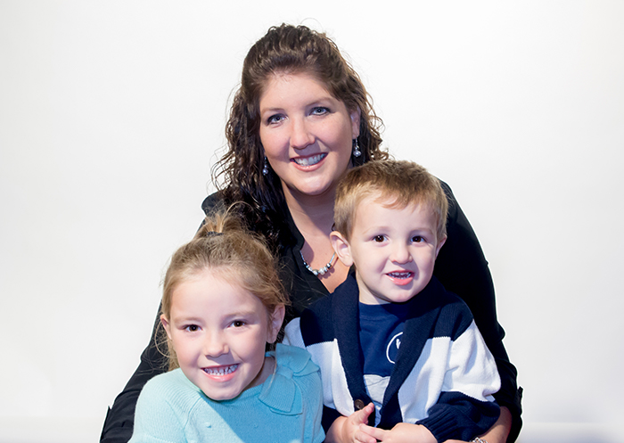 Melissa with her daughter Isabella, who wears a hearing implant